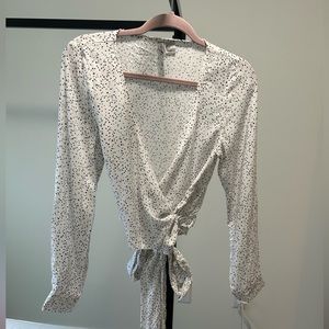 Wrap long sleeve patterned top